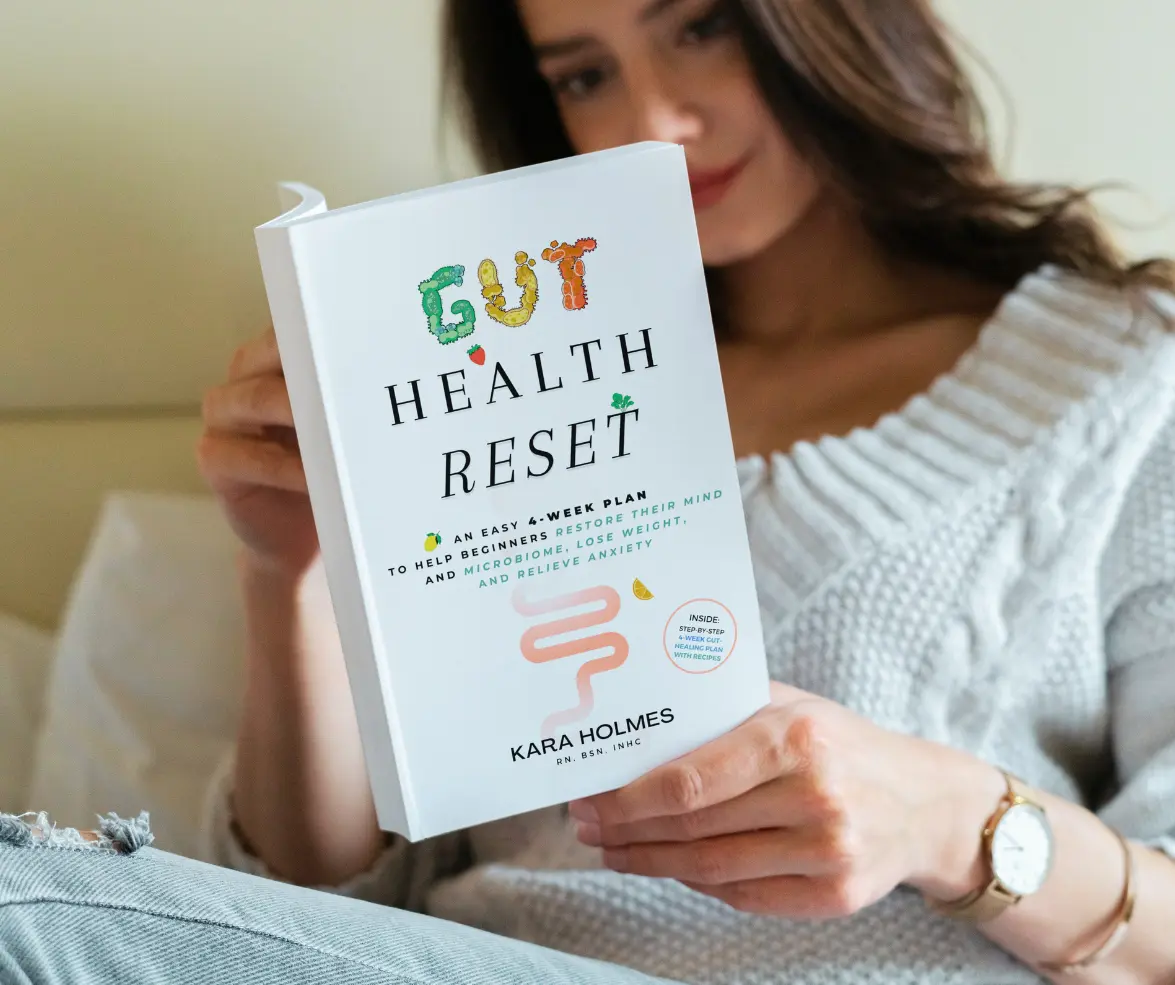 Women Reading Health Reset Book